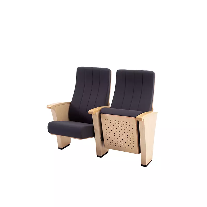 Pair of black upholstered auditorium chairs with light wood armrests and perforated panel on the side.