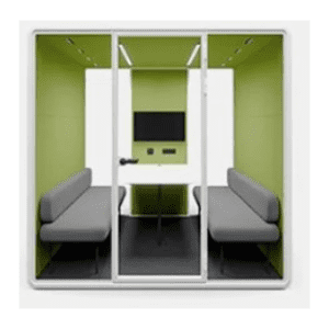 Glass walled meeting pod with lime green interior two gray sofas a small table and a wall mounted display screen behind the glass doors
