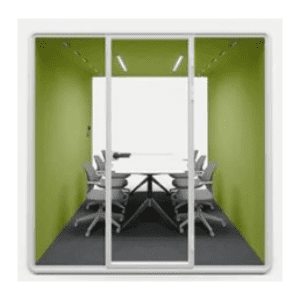 Green walled meeting room with glass doors long conference table and grey chairs around it whiteboard at the far end