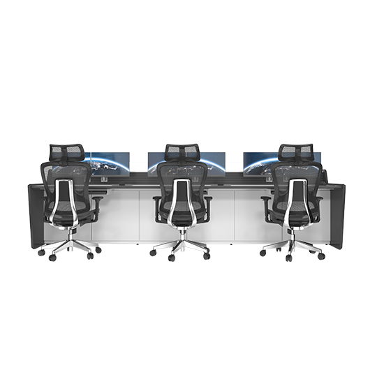 Three-person computer workspace with ergonomic mesh chairs and multiple monitors at each station.