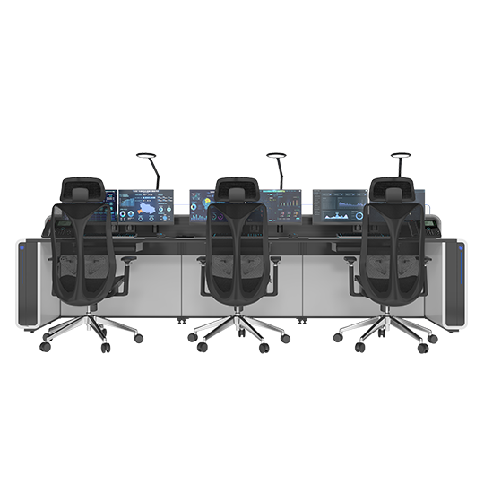 Three ergonomic office chairs at a long control desk with multiple computer monitors and mic boom arms.